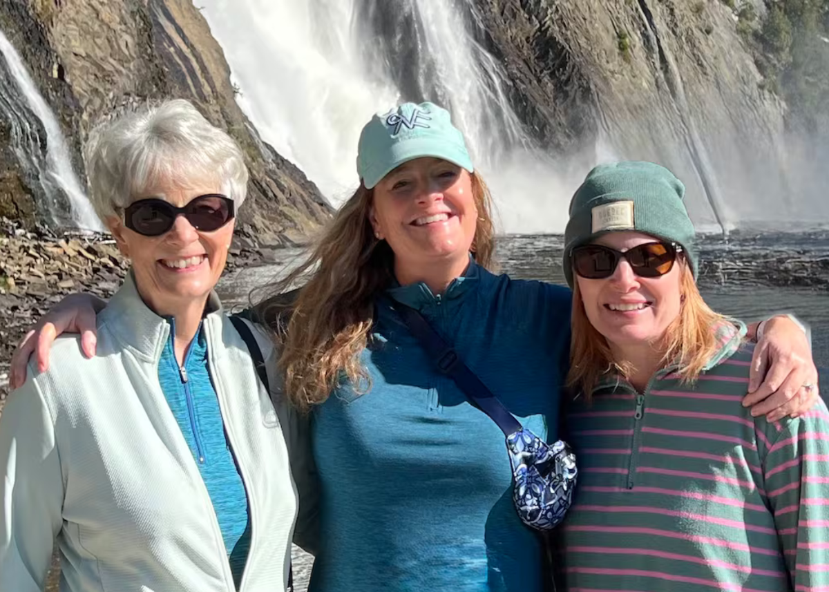 Bridget Burnett, centre, poses for a photo with her mother and sister in this undated photo from a trip to Quebec. (Handout/The Canadian Press)